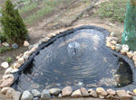 Искусственный пруд с фонтаном